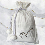 White (Mummy is in gold text)